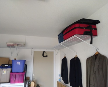 Garage shelves installed by a handyman