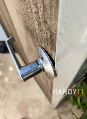 a door handle installed on the door incorrectly.