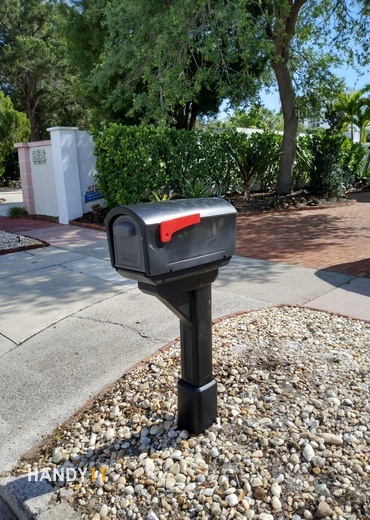 Black plastic mail post
