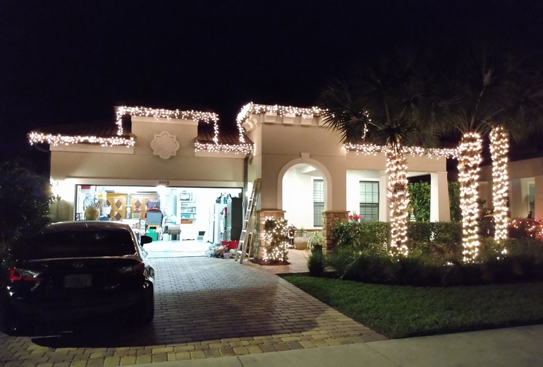 Christmas lights hanged over house.