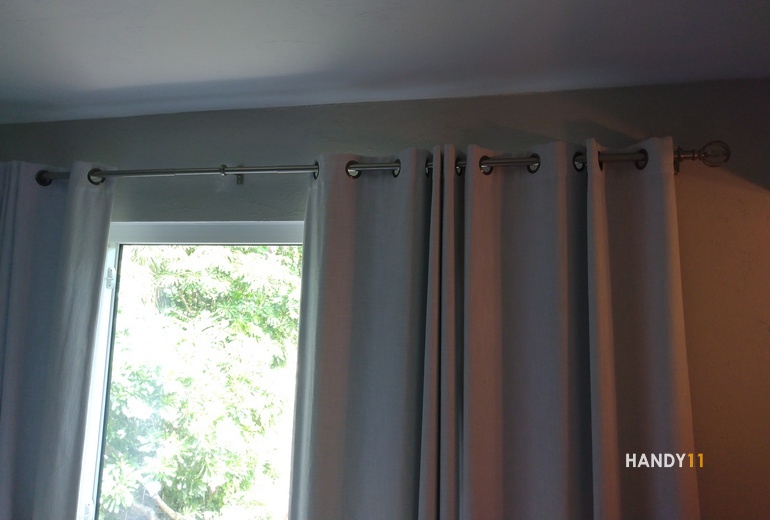 Curtain rods and curtains.
