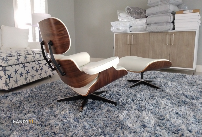 Brown-white chair and ottoman.