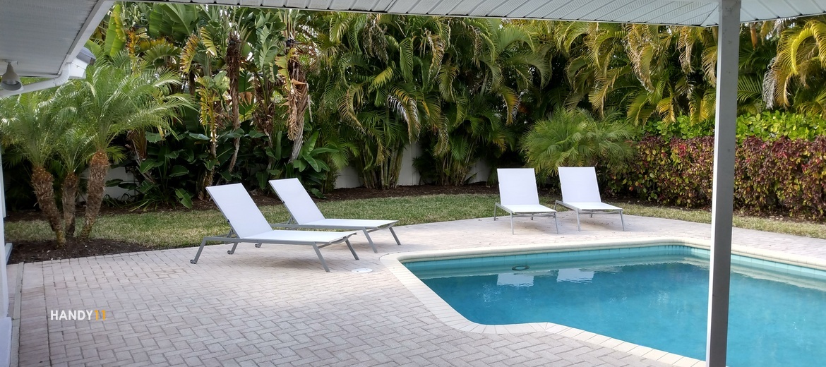 Outdoor poolside chairs assembled.
