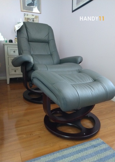 Green leather recliner assembled.