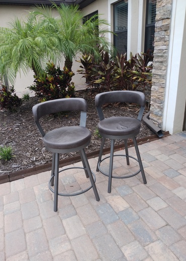 Grey leather metal bar stool assembled.