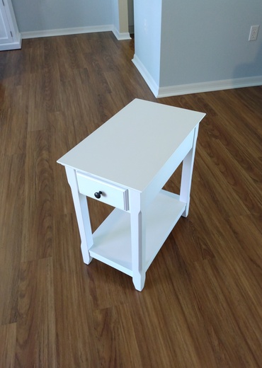 White square top end table assembled.