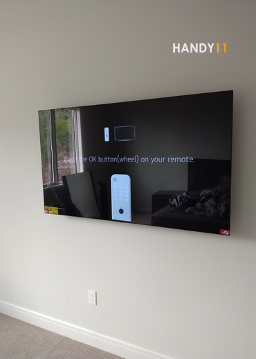 TV with in-wall wiring mounted.