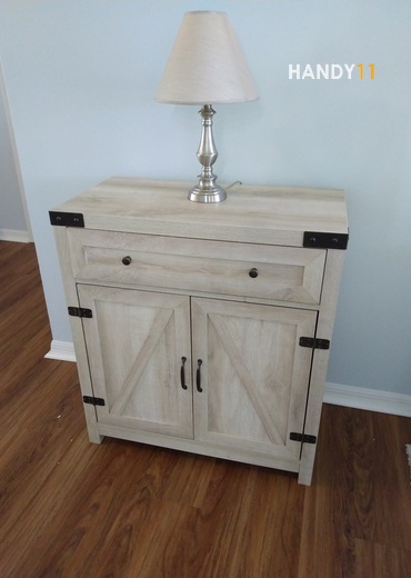 Light grey wood 1 drawer 2 doors cabinet assembled.